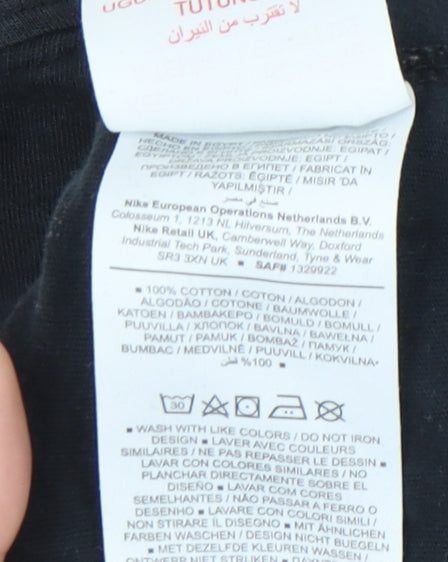 Brand and care label for Nike girls’ black xl t-shirt, relaxed fit, 100% cotton
