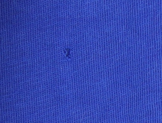 Brand and care label for Adidas boys’ blue t-shirt, size 13-14, years, logo accent