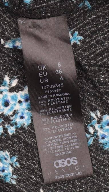 Close-up detail of ASOS Women’s Black Floral Dress, size UK 8, Polyester