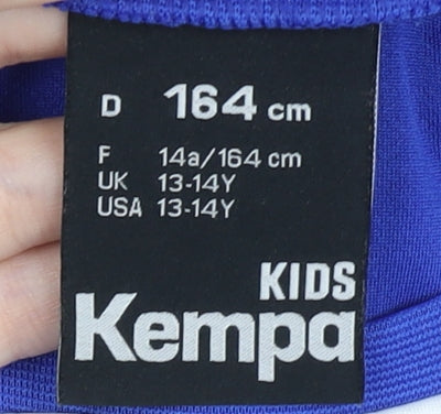 Brand and care label for Kempa boys’ blue athletic gym t-shirt 13-14 years - moisture wicking