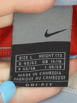 Brand and care label for Nike unisex orange jersey activewear top, size 14
