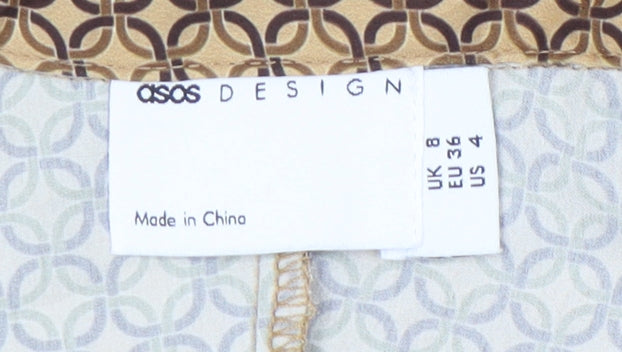 Close-up detail of ASOS DESIGN Women's Brown Geometric Dress, size 8