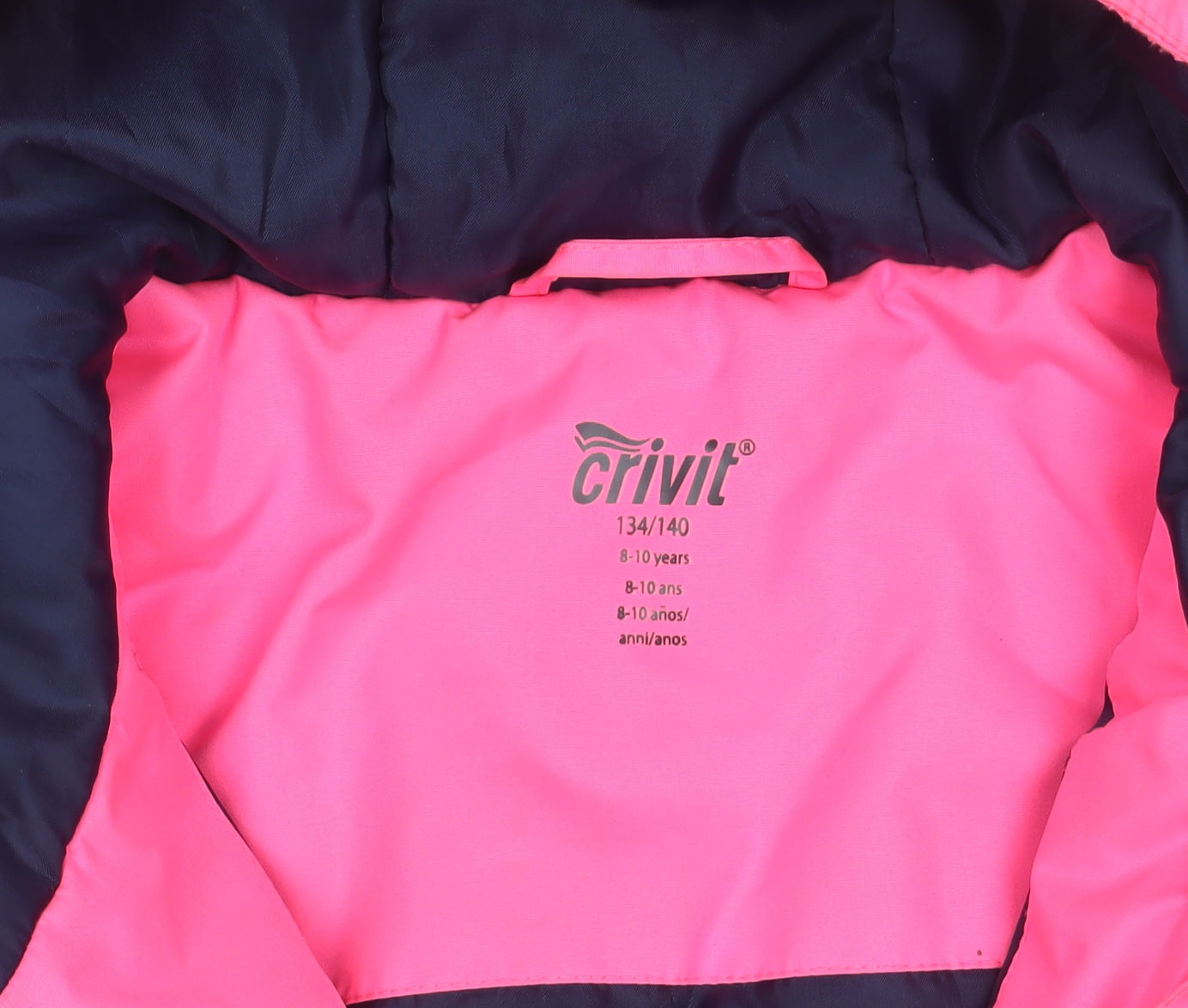 Brand and care label for Crivit girls’ pink puffer jacket 9-10 years hooded waterproof