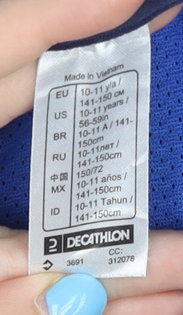 Close-up detail of Decathlon boys’ blue t-shirt 10-11 years sports top