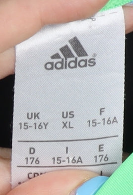 Brand and care label for Adidas boys’ black t-shirt 15-16 years for gym & training