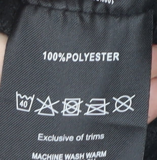 Brand and care label for All Terrain boys’ black fleece jacket, size 13, winter essential