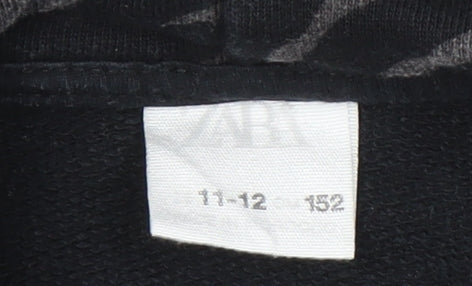 Brand and care label for Zara Girl's Black Animal Print Hoodie 11-12 Years