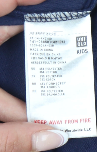 Brand and care label for Uniqlo girls’ blue graphic t-shirt, 9-10 years, cotton blend