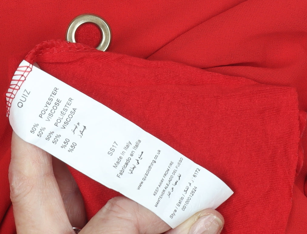 Close-up detail of QUIZ Women's Red Flared Sleeve Top