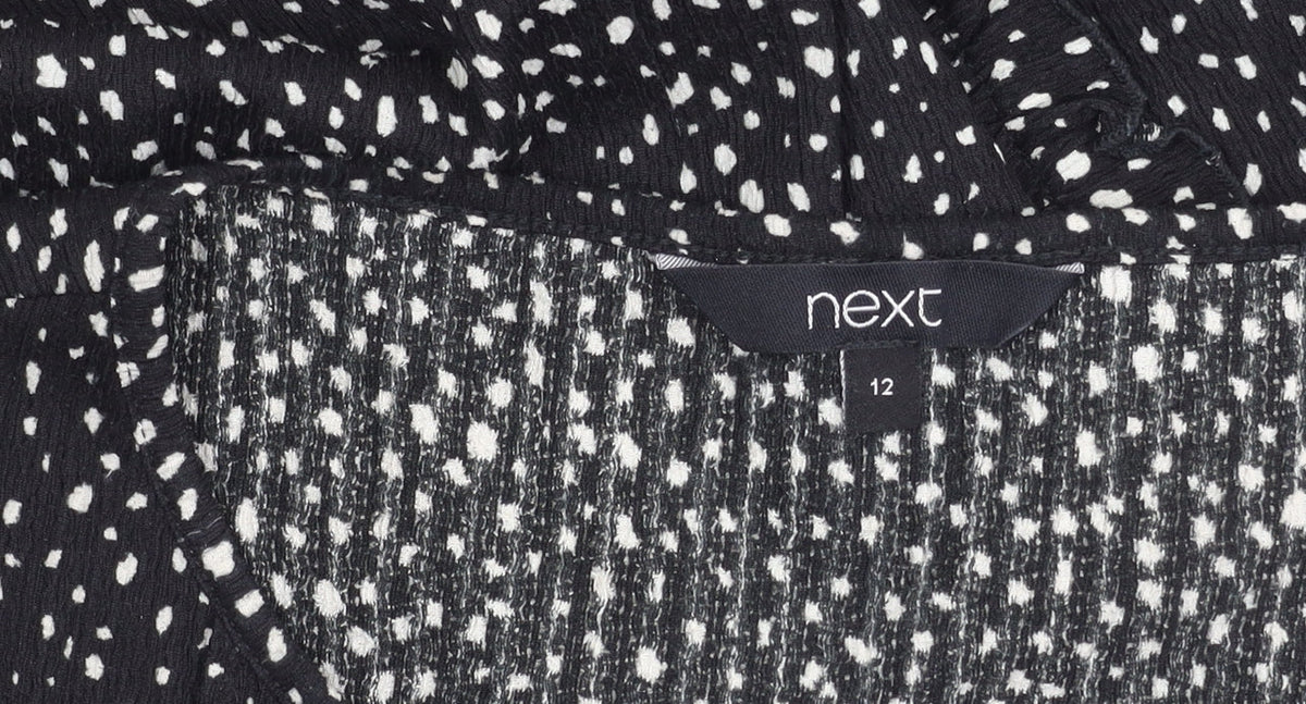 Brand and care label for Next Women's Black Polka Dot Balloon Sleeve Top