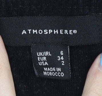 Brand and care label for Atmosphere Women's Black Pinafore Dress, size 6