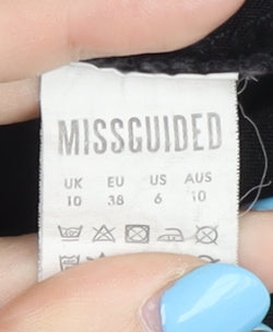 Brand and care label for Missguided Women's Black Skinny Jeans, size 10