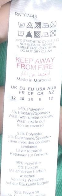 Brand and care label for PRETTYLITTLETHING Women's Green Bodycon Dress, size 12