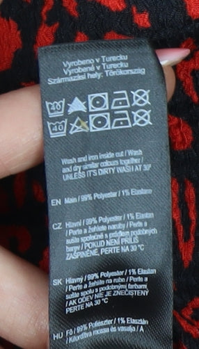 Brand and care label for F&F Women's Red Animal Print Long Sleeve Dress