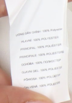 Brand and care label for Missguided Women's White Wrap Blouse UK, size 14