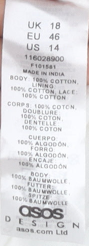 Close-up detail of ASOS Design Women's White Halter Dress, size 18
