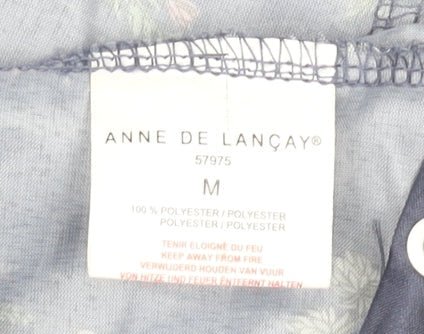 Close-up detail of Anne De Lançay Women's Blue Floral Rain Coat M