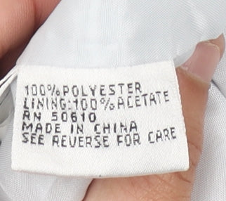 Brand and care label for Kasper Women's White Blazer, size 4, Regular Fit, Notch Lapel