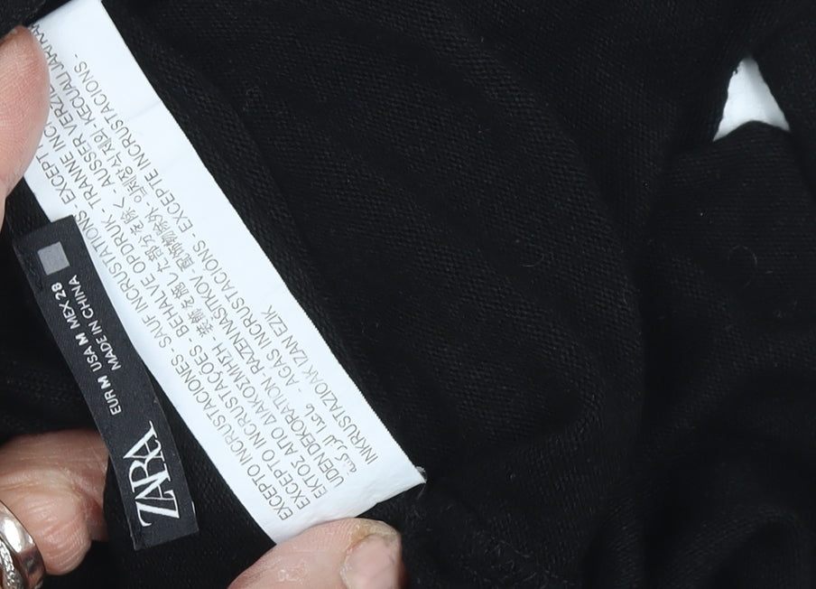 Close-up detail of Zara Women's Black V-Neck Cotton jumper, size 10