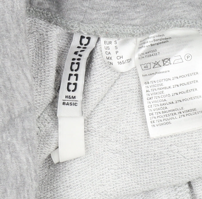Close-up detail of H&M Women's Grey Sweatpants, size 40, Relaxed Fit