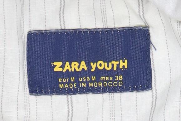 Brand and care label for Zara boys’ black cotton corduroy waistcoat age 10 formal party wedding