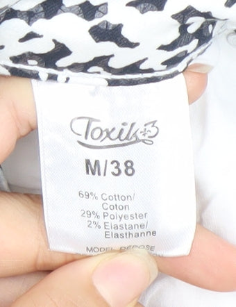 Brand and care label for Toxik3 women’s multicoloured animal print skinny jeans, size UK 10