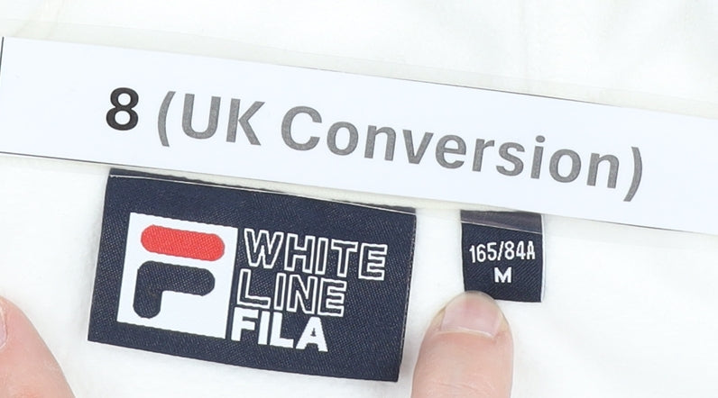 Brand and care label for Fila Women’s White Track Jacket, size UK 8, Geometric Hooded Full Zip