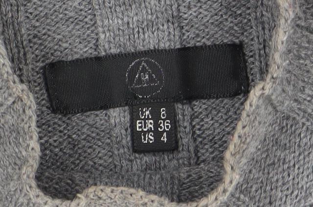 Brand and care label for Missguided Women's Grey Wool Blend Ribbed jumper, size 8