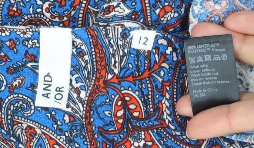 Brand and care label for AND/OR Women’s Multicoloured Paisley Viscose Button-Up Blouse, size UK 12
