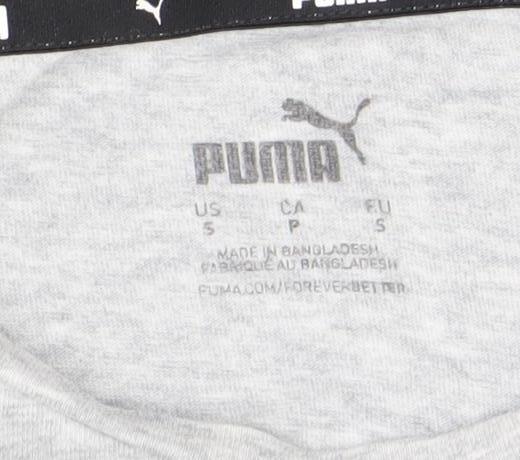 Brand and care label for Puma boys’ grey long sleeve sports t-shirt, size S, cotton crew neck
