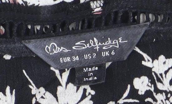 Brand and care label for Jane Schofield women’s black floral cotton tunic blouse uk 8