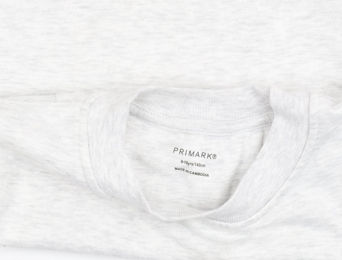 Brand and care label for Primark girls’ grey sweatshirt 9-10 years crew neck logo print