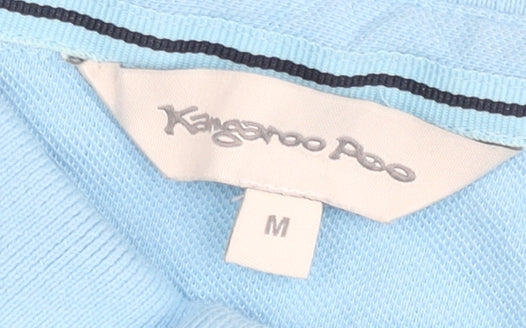 Brand and care label for Kangaroo Poo men’s blue polo shirt, size M, short sleeve cotton