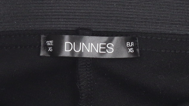 Brand and care label for Dunnes women’s black xs high rise stretch leggings