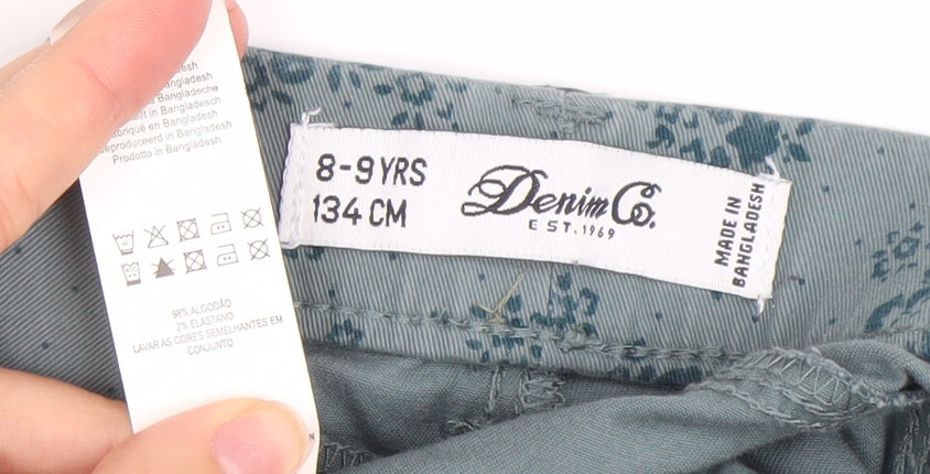 Brand and care label for Denim Co. girls’ green floral skinny jeans 8-9 years stretch cotton