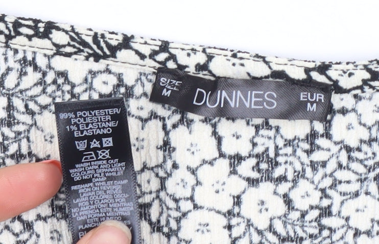Brand and care label for Dunnes Women’s Black Floral Bodycon Dress, size UK 12, V-Neck Long Sleeve