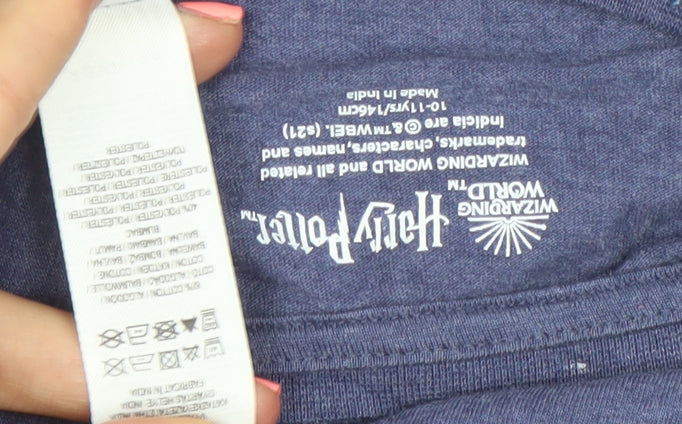 Brand and care label for Harry Potter girls’ blue gryffindor graphic t-shirt, size 146