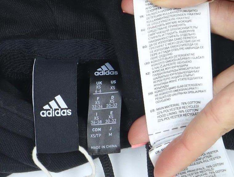 Brand and care label for Adidas women’s black pullover hoodie xs cotton blend logo sweatshirt