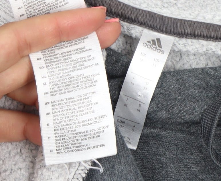 Brand and care label for Adidas Men Grey Pullover Hoodie Medium Regular Fit Logo Cotton Blend