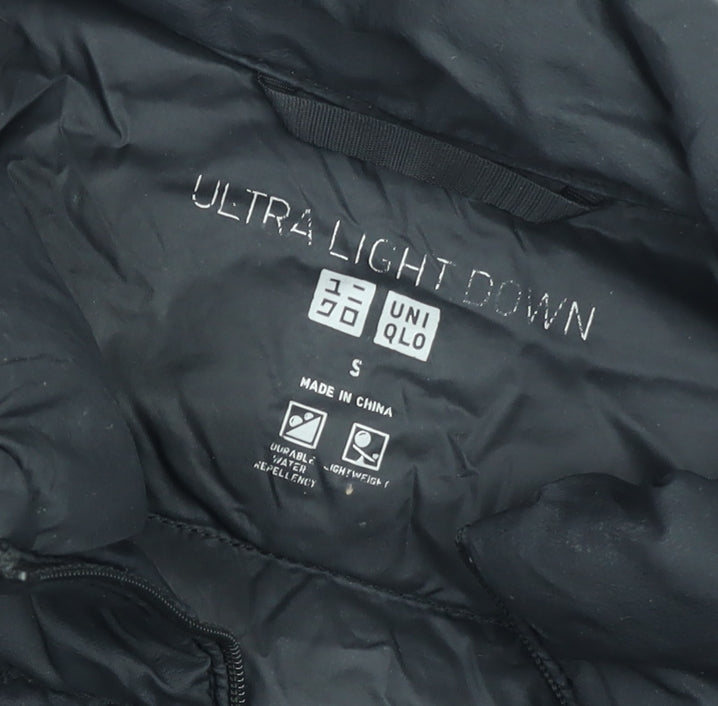 Brand and care label for Uniqlo boys’ black s ultra light down puffer jacket