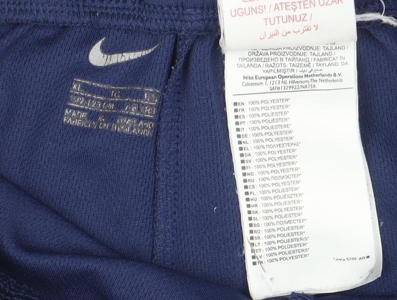 Brand and care label for Nike boys’ blue xl athletic football activewear shorts