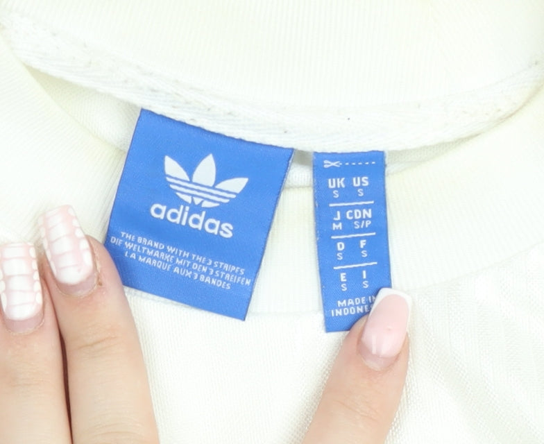 Brand and care label for Adidas men’s white short sleeve crew neck t-shirt, size S