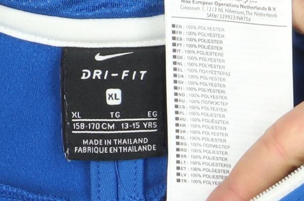 Brand and care label for Nike boys’ blue dri-fit xl 1/4 zip sports sweatshirt