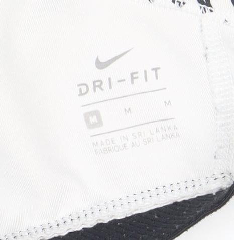 Brand and care label for Nike girls’ white black dri-fit sports bra m athletic tank top