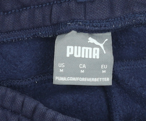 Brand and care label for Puma Men's Blue Joggers M Fleece Sweatpants Elastic Waist