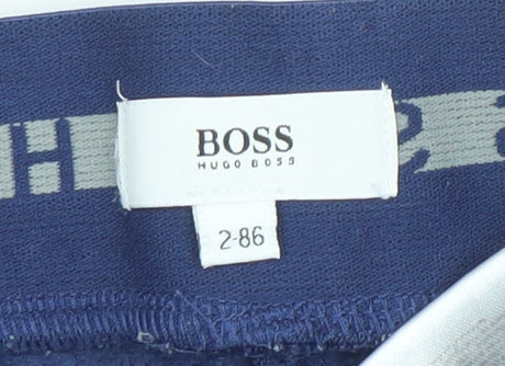 Brand and care label for Hugo Boss boys’ blue jogger sweatpants 2 years cotton blend