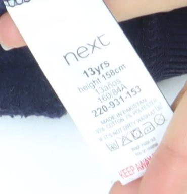 Brand and care label for Next girls’ blue colourblock full zip hoodie 13 years