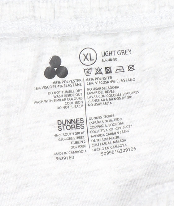 Brand and care label for Dunnes women’s light grey sweat shorts, size XL, regular fit