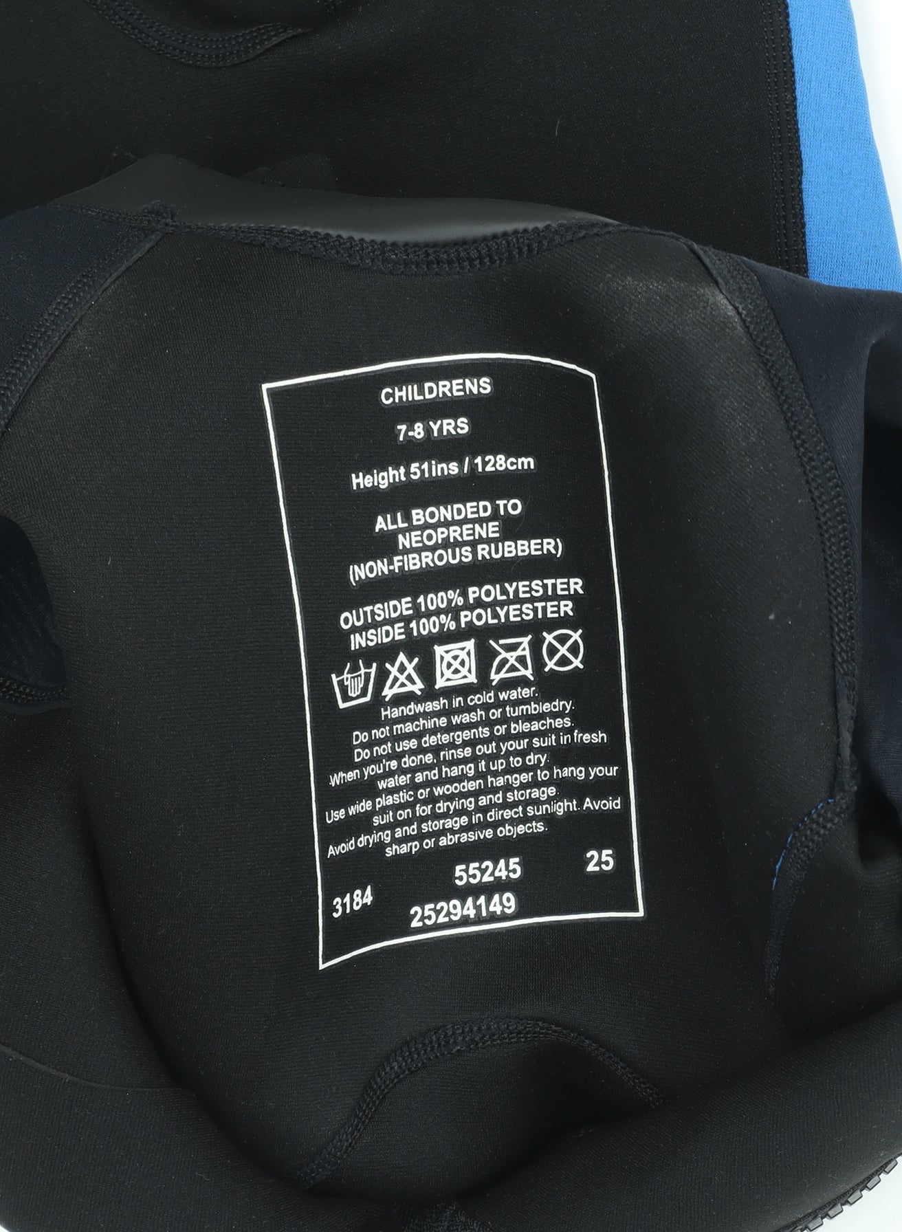 Brand and care label for Waiiha boys’ black blue short sleeve neoprene wetsuit 7-8 years