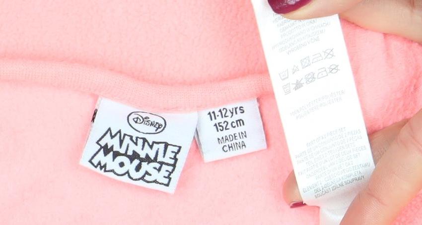 Brand and care label for Disney girls’ pink minnie mouse long sleeve fleece pullover t-shirt 11-12 years